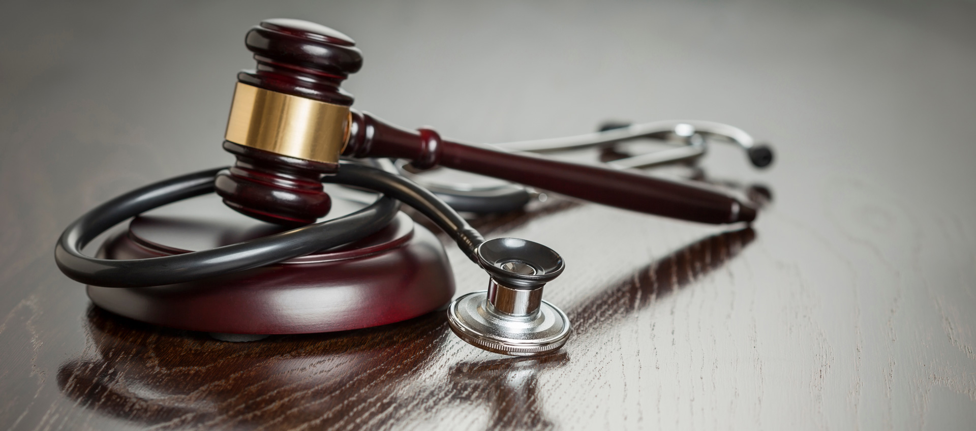judge's gavel and stethoscope
