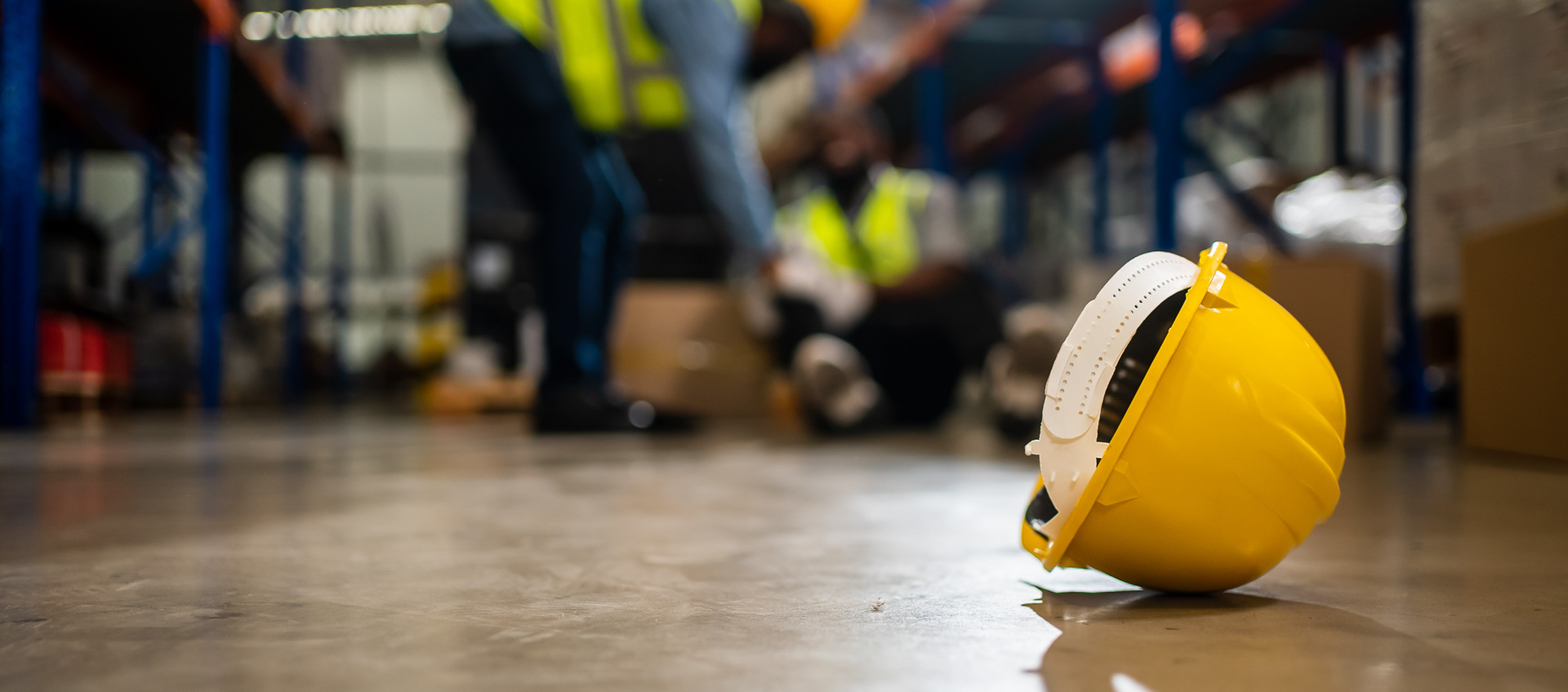 hard hat on floor near injured employee